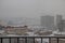 City pollution mixed with morning fog in winter time, Belgrade cityscape from roof top of the building in downtown