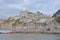 City of Porto along river Douro on a sunny day, with colorful houses and episcopal palace