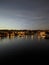 The city of Prague unfolding in the soft glow of evening as seen from the iconic Charles Bridge