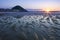 City reflected in the water of the beach at sunset, San Sebastian