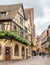 City scene of Riquewihr under cloudy sky, France