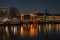 City scenic from Amsterdam at the Amstel in the Netherlands at night