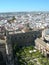 City skyline with foreground castle courtyard