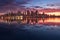 city skyline reflecting onto calm water at twilight