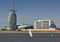 City skyline with seashore and sailing boat and buoy