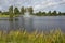 City Smiltene, Latvia.Fountain in the lake and around tree