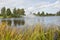 City Smiltene, Latvia.Fountain in the lake and around tree