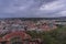 City square wide view on Mendlovo namesti with cars and public transport, trams passing square day to night capture, view above