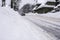 City street under heavy snow in Zakopane, Poland.