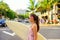 City surf woman surfer with surfboard in Waikiki