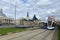 A city tram rides through the streets of the city. The tram goes through the city of Moscow