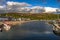 City Of Ullapool With Old Fishing Boat At Loch Broom In Scotland