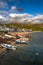 City Of Ullapool With Old Fishing Boat At Loch Broom In Scotland