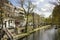 City of Utrecht, the Netherlands with canal, trees, water, blue sky, white clouds and wharves