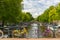 City view of Amsterdam canals and typical houses, Holland, Netherlands.