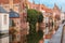 City view of Bruges canal with beautiful houses