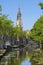 City view of Delft with canal and New Church Tower