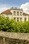 City villa roof garden in sunshine at a park with old city wall