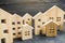 City of wooden figurines of houses. Buying and selling real estate. Renovation and home improvement. Mortgage loan. Building