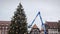 City worker setting up Christmas Tree on city square in Strasbourg, France