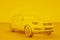 City yellow premium SUV on a yellow background. 3d rendering