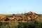 Cityscape against the backdrop of mountains and desert along the road from Ouarzazate