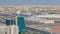 Cityscape of Ajman from rooftop with modern buildings timelapse.