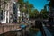 Cityscape of Amsterdam, Netherlands. Parking near the canal. Dutch urban architecture. Tourism in Europe