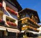 Cityscape of architecture of decorated facades with balconies in Vigo di Fassa, Italy