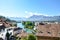 Cityscape of the beautiful city Thun in Switzerland. The historic old town located by turquoise Aare River. Swiss Alps with snow-