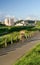 Cityscape of bicycle driver at riverbank