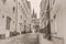 Cityscape, in black-and-white color - view of a medieval street near the Great Saint Martin Church in Cologne