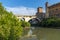 Cityscape with Castello Caetani, Tiber River and Pons Fabricius in city of Rome, Italy