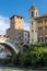 Cityscape with Castello Caetani, Tiber River and Pons Fabricius in city of Rome, Italy