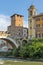 Cityscape with Castello Caetani, Tiber River and Pons Fabricius in city of Rome, Italy