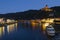 Cityscape of Cochem from the Mosel river during sunset and night lights