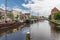 Cityscape Dutch city Zwolle with canal and old sailing ships