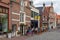 Cityscape Dutch Ootmarsum with historic houses and small restaurant