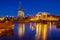 Cityscape - evening view of the city canal with drawbridge and windmill, the city of Leiden