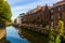 Cityscape of Ghent with traditional Flemish townhouses on banks of Leie river