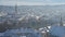 Cityscape of Graz with Church of the Sacred Heart of Jesus and historic buildings rooftops with snow, in Graz, Styria region,