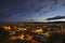 Cityscape of Graz with Mariahilfer church and historic buildings, in Graz, Styria region, Austria, by night