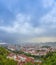 Cityscape of Graz with Mariahilfer church and historic and modern buildings of Graz, Styria region, Austria, at sunset. Dramatic