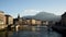 Cityscape of Grenoble, France with the Isere river, the renoved Saint Laurent bridge and the famous ca