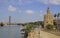 The cityscape with Guadalquivir river in Seville,