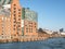Cityscape of Hamburg, Germany, with historic warehouses, fish auction hall and river Elbe