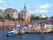 Cityscape of Hamburg with launches and work boats in Hamburg\\\'s inland port