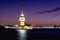 Cityscape of historic Istanbul with the illuminated Maiden`s/Leander`s Tower and the skyline in the evening.