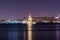 Cityscape of historic Istanbul with the illuminated Maiden`s/Leander`s Tower and the skyline in the evening.