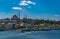 Cityscape of Istanbul with magnificent SÃ¼leymaniye Mosque, flying seagull, sailing ferryboats and EminÃ¶nÃ¼ embankment.